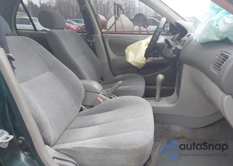 2000 Toyota Corolla Ce z USA, uszkodzony, nr VIN 2T1BR12E9YC340343